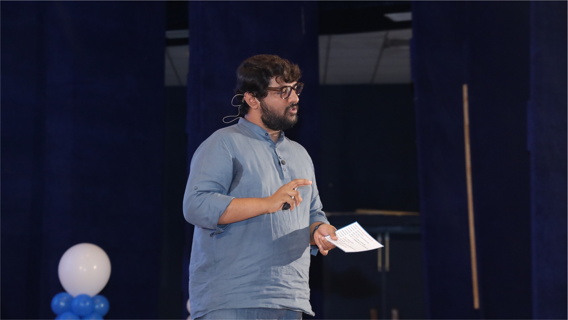 Women walking between trees